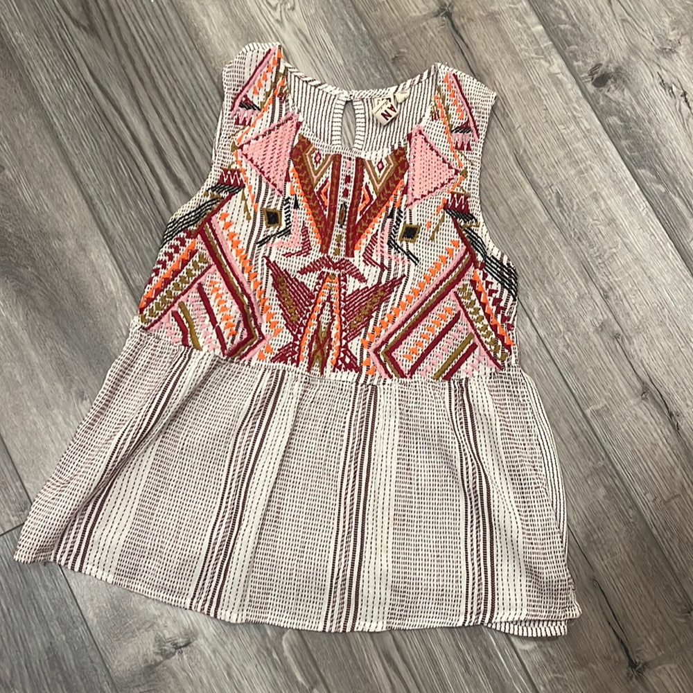 Size small tank top made in India. White with maroon, pink and orange accents